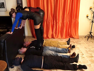 Dominant Ladies Trampling Submissive Men in Leather