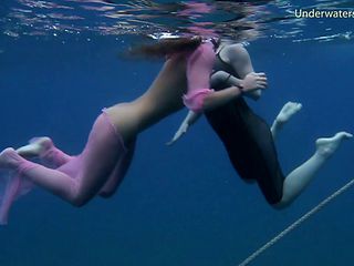 Two sexy babes strip down while diving in the ocean