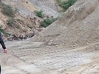 Grandma Is Walking Around a Gravel Pit in Tight Leggings and High Heels!
