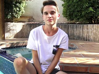 Cute twink Cody Wilson jerks off by the pool
