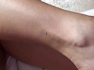 Pink Toes Gives Footjob on the Massage Table!