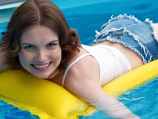 A sexy short solo with Milka Wey by the pool