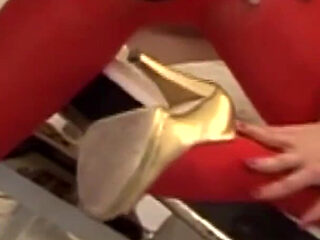 Stunning blonde babe in pantyhose is pleasing big cock with her feet