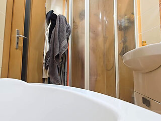 A Busty BBW Showering in the Shower Cabin, Shaving Her Armpits, Pussy, and Legs.