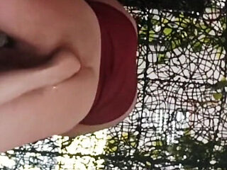 Dominatrix Shoves Her Foot Into the Ass of a Submissive Guy