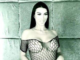 Busty curly brunette with big boobs fucks on couch