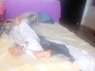 Sensual massage of a hot couple with oil on the body.