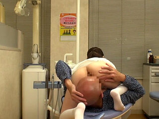 Elegant Dental Hygienist Leaning Close