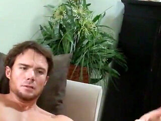 Black-haired milf with big sloppy tits lets her boyfriend pamper her on the couch at home