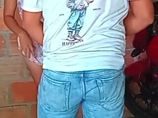 Mechanic Measures the Oil of the Neighbor's Motorcycle