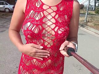 Lace sundress flaunts big tits and pussy in the wild