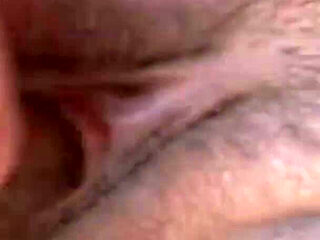 Horny couple fucking on the end of a beach