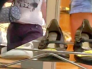 Street cam catches a scantly clad girl shopping
