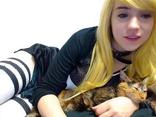 Teasing redhead teen in white stockings stripes on bed