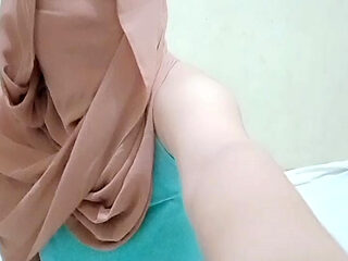 Playing with pussy is very seductive for hijab girls