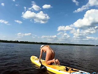 Big-Ass Blonde's Naked Walk on a Paddleboard