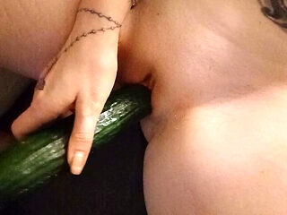 Playful private erotic adventure with a cucumber in front of the camera