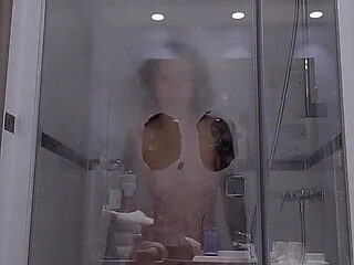 A Slut Dildos Herself During Her Shower, Comes to Watch on Her Through the Transparent Glass Window
