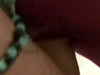 Grey nylon mask and pink pantyhose legs
