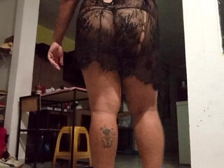 Chubby Mexican milf shows her ass in the kitchen