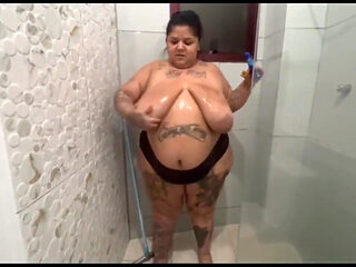 Naughty Girl Applies Oil Before the Shower