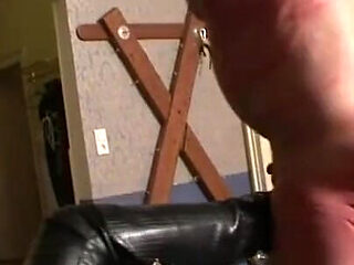 Blonde MILF humiliates masked pig