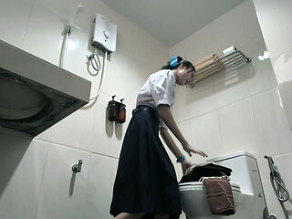 Change into a school uniform in the restroom