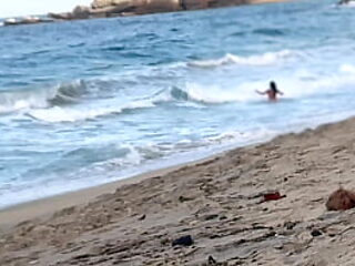 Latina babe deep throats and gets fucked on a public beach