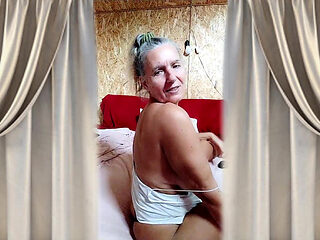 Hot Housewife Lukerya on a Large Bed