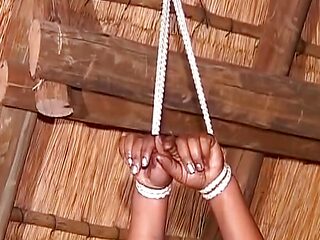 Mature ebony German bitch tied up and fucked by dildo