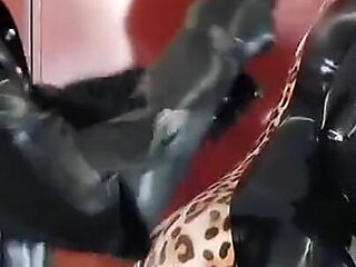 Latex Rubber Petting- Curvy MILF and Her Submissive Guy - Polishing Oiling and Petting in the Plane