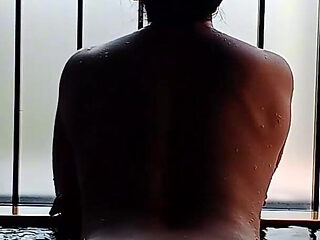 A Married Woman Taking a Bath in a Hotel Room