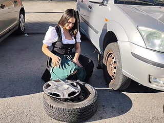 Dirndl Slut Gets Dirty and Oily Changing Tires