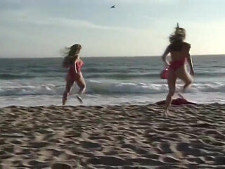 This tall redheaded lifeguard is showing her knockers and fucking her boyfriend