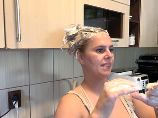 Hair Wash with Dishwasher Liquid in Kitchen Sink