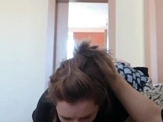 While he watches TV, I give him a blowjob
