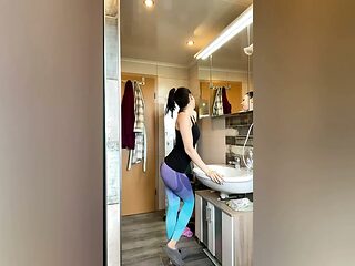Pretty female gets wet in steamy shower