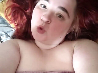 Redhead in the Bed