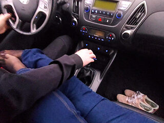 Amateur MILF in Jeans and Nylon Socks Gives a Taxi Driver a Footjob