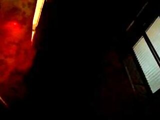 Hot young woman gives handjobs in the men's restroom at a bar