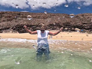 Girl Wetting Jeans in the Ocean and Swimming in Wet White T-shirt