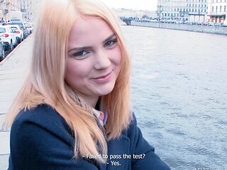 A long-haired blonde, Lolly Small, enjoys riding a big cock in the bedroom