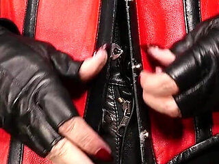 Lady Amber Encases Slave Mila Layers of Leather