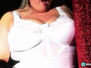 Retro babe Kandi shows off her big natural tits in sexy lingerie