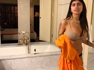 Mia Khalifas Big Tits Soak in Steamy Shower