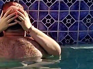 Hot Long Haired Ginger MILF Taking a Dip and Fucking in Outdoor Pool