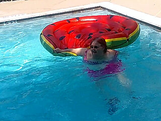 Short Video of BBW Nurse Vicki Floating on Her Huge Watermelon