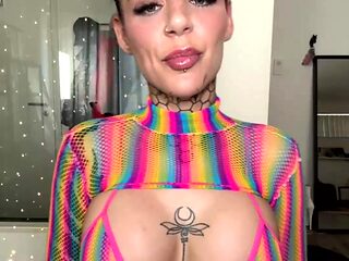 Inked Hottie with Buns Teases in Shiny Rainbow Mesh Top