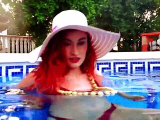 Ariel Ortiz likes to swim in the pool, while her neighbor sees her wank. She is a stunning sandy-haired, who likes to be observed in the pool
