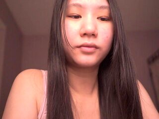 Cute Asian girl reads aloud in ASMR
